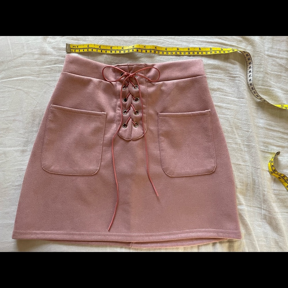 Pink lace up faux suede skirt with pockets